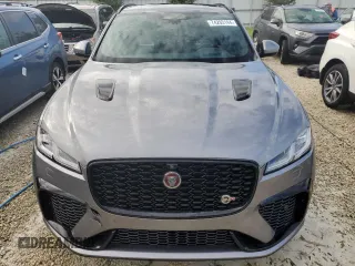 2022 Jaguar F-Pace SVR z VIN SADCZ2EE4NA702878, wystawiony jako Copart lot #74293144 z przebiegiem Nie podano mil oraz Szkoda całkowita • Salvage title. Historia ofert i sprzedaży dostępna na DreamBid. Obrazek 5.