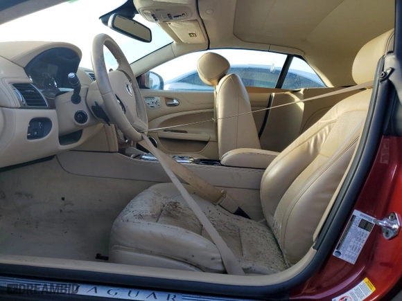 2010 Jaguar XK with VIN SAJWA4GB5ALB36814, listed as a Copart auction lot 74855444 with 0 mi miles and Salvage Title. Bid and sale history available at carsss.com. Image 7.