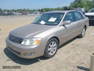 2002 Toyota Avalon XL with VIN 4T1BF28BX2U266853, listed as a IAAI auction lot 42091935 with 176,192 mi miles. Bid and sale history available at carsss.com. Image 2.