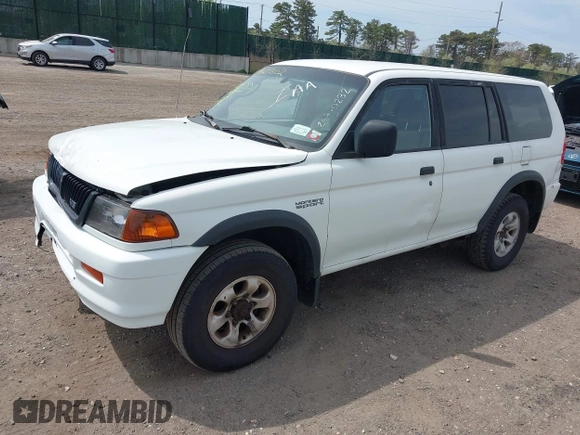 1998 Mitsubishi Montero LS z VIN JA4MT31P1WP032729, wystawiony jako IAAI lot #42040307 z przebiegiem 172 602 mil mil oraz . Historia ofert i sprzedaży dostępna na DreamBid. Obrazek 2.