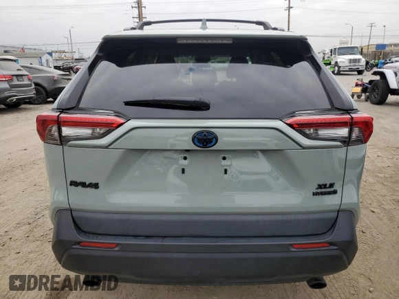 2021 Toyota RAV4 Hybrid XLE with VIN 2T3RWRFV8MW116853, listed as a Copart auction lot 65974935 with 89,319 mi miles and Salvage title. Bid and sale history available at DreamBid. Image 6.