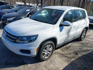 2012 Volkswagen Tiguan SE with VIN WVGAV7AX9CW590965, listed as a IAAI auction lot 41852407 with 153,953 mi miles and . Bid and sale history available at DreamBid. Image 2.