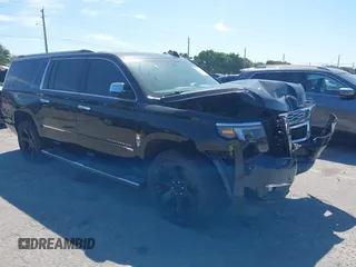 2019 Chevrolet Suburban LT with VIN 1GNSCHKC7KR180427, listed as a IAAI auction lot 41742016 with 71,315 mi miles and . Bid and sale history available at DreamBid. Image 1.