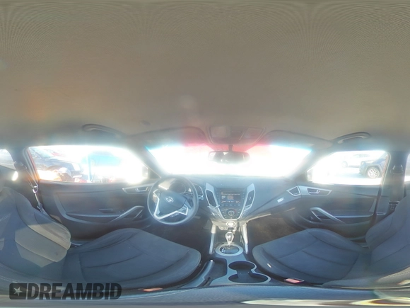 2014 Hyundai Veloster z VIN KMHTC6AD8EU213234, wystawiony jako Copart lot #53297535 z przebiegiem 131 769 mil mil oraz Szkoda całkowita • Salvage title. Historia ofert i sprzedaży dostępna na DreamBid. Obrazek 13.