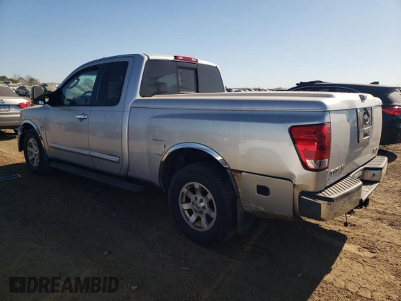 2004 Nissan Titan SE with VIN 1N6AA06AX4N506104, listed as a Copart auction lot 76545534 with 174,129 mi miles and Salvage Title. Bid and sale history available at carsss.com. Image 2.