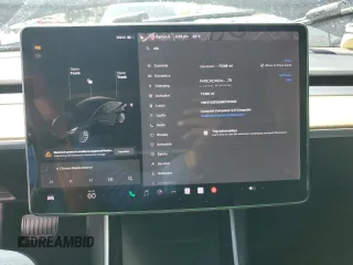 2019 Tesla Model 3 Mid Range z VIN 5YJ3E1EA9KF314143, wystawiony jako Copart lot #53564335 z przebiegiem 77 168 mil mil oraz Szkoda całkowita • Salvage title. Historia ofert i sprzedaży dostępna na DreamBid. Obrazek 9.