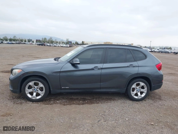 2013 BMW X1 28i with VIN WBAVM1C51DVW42577, listed as a IAAI auction lot 42029627 with 140,343 mi miles. Bid and sale history available at carsss.com. Image 15.