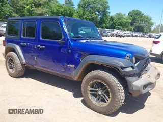 2018 Jeep Wrangler Unlimited Sport S with VIN 1C4HJXDG4JW179772, listed as a IAAI auction lot 42083107 with 148,209 mi miles and . Bid and sale history available at DreamBid. Image 1.