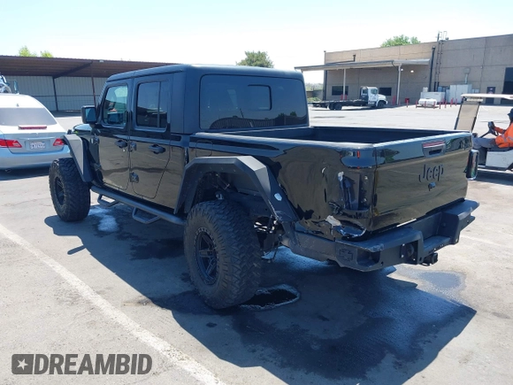 2020 Jeep Gladiator Sport S with VIN 1C6HJTAGXLL123540, listed as a IAAI auction lot 42453999 with 27,855 mi miles and . Bid and sale history available at DreamBid. Image 3.