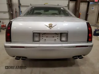 2000 Cadillac Eldorado Touring ETC z VIN 1G6ET1294YU180525, wystawiony jako Copart lot #89253455 z przebiegiem 102 230 mil mil oraz Nie do naprawy • Non repairable. Historia ofert i sprzedaży dostępna na DreamBid. Obrazek 6.