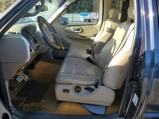 2002 Ford F-150 XL with VIN 1FTRX17L72NA39909, listed as a Copart auction lot 76376994 with 175,926 mi miles and Salvage title. Bid and sale history available at DreamBid. Image 7.