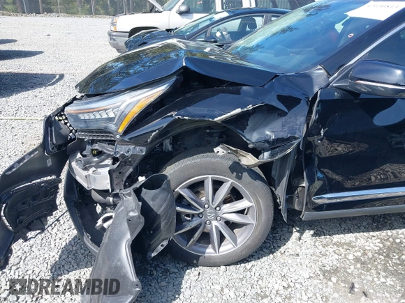 2021 Acura RDX w/Technology Package with VIN 5J8TC2H55ML006429, listed as a IAAI auction lot 42030813 with 42,712 mi miles. Bid and sale history available at carsss.com. Image 6.