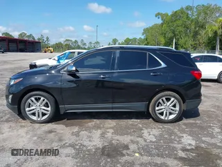 2018 Chevrolet Equinox Premier with VIN 2GNAXNEX1J6313528, listed as a IAAI auction lot 41938985 with 189,244 mi miles and . Bid and sale history available at DreamBid. Image 14.