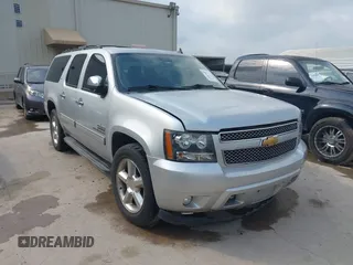 2013 Chevrolet Suburban LT with VIN 1GNSCJE03DR164477, listed as a IAAI auction lot 42083985 with 150,540 mi miles. Bid and sale history available at carsss.com. Image 1.
