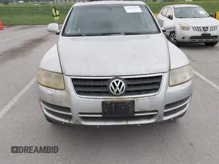 2007 Volkswagen Touareg V6 z VIN WVGZE77L57D001046, wystawiony jako IAAI lot #42283224 z przebiegiem 243 861 mil mil oraz . Historia ofert i sprzedaży dostępna na DreamBid. Obrazek 12.