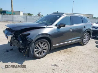 2020 Mazda CX-9 Grand Touring z VIN JM3TCADY8L0417775, wystawiony jako IAAI lot #42306864 z przebiegiem 35 287 mil mil oraz . Historia ofert i sprzedaży dostępna na DreamBid. Obrazek 18.