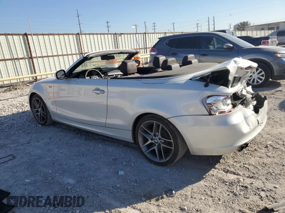 2013 BMW 1 Series 128i with VIN WBAUL7C53DVU09950, listed as a Copart auction lot 77703764 with 94,378 mi miles and Salvage title. Bid and sale history available at DreamBid. Image 2.