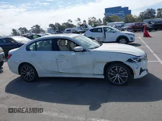 2019 BMW 3 Series 330i with VIN WBA5R1C55KAK12332, listed as a IAAI auction lot 41692035 with 13,657 mi miles and . Bid and sale history available at DreamBid. Image 13.