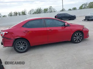 2017 Toyota Corolla L z VIN 5YFBURHE9HP610157, wystawiony jako IAAI lot #40999523 z przebiegiem 185 454 mil mil oraz . Historia ofert i sprzedaży dostępna na DreamBid. Obrazek 13.