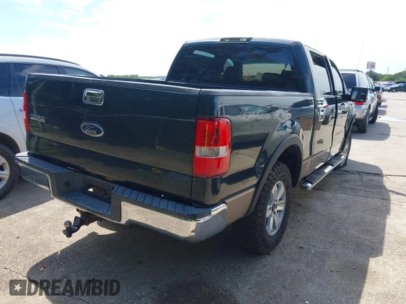 2004 Ford F-150 XLT with VIN 1FTRW14W14KC06268, listed as a IAAI auction lot 42444789 with 408,530 mi miles and . Bid and sale history available at DreamBid. Image 4.