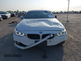 2015 BMW 4 Series 428i z VIN WBA3N7C58FK224500, wystawiony jako IAAI lot #42044727 z przebiegiem 71 815 mil mil oraz . Historia ofert i sprzedaży dostępna na DreamBid. Obrazek 12.