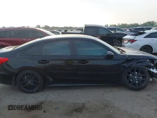 2023 Honda Civic Sport z VIN 2HGFE2F51PH503134, wystawiony jako IAAI lot #42264812 z przebiegiem 13 582 mil mil oraz . Historia ofert i sprzedaży dostępna na DreamBid. Obrazek 14.