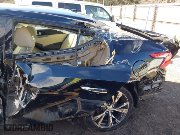 2016 Nissan Maxima SV with VIN 1N4AA6AP7GC435032, listed as a IAAI auction lot 41613039 with 104,274 mi miles and . Bid and sale history available at DreamBid. Image 6.