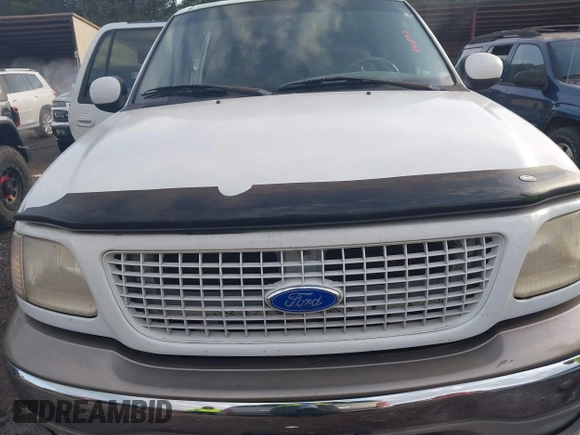 2000 Ford Expedition XLT with VIN 1FMEU1767YLB19633, listed as a IAAI auction lot 41594877 with 288,439 mi miles and . Bid and sale history available at DreamBid. Image 6.