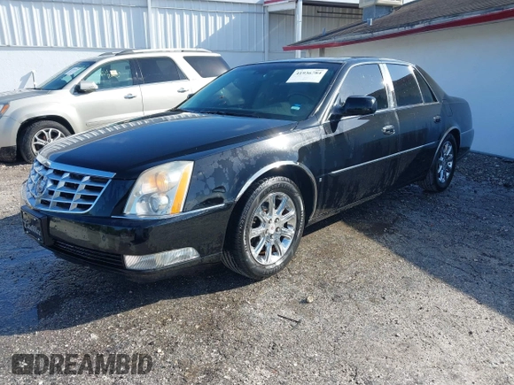 2008 Cadillac DTS 1SC with VIN 1G6KD57Y18U195569, listed as a IAAI auction lot 41936784 with 123,924 mi miles and . Bid and sale history available at carsss.com. Image 2.