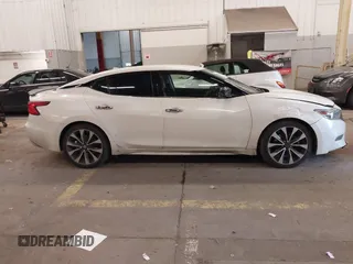 2016 Nissan Maxima SL with VIN 1N4AA6AP2GC399721, listed as a IAAI auction lot 41818252 with 64,386 mi miles and . Bid and sale history available at DreamBid. Image 13.