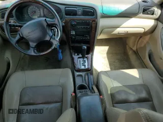 2001 Subaru Legacy Outback L.L. Bean with VIN 4S3BH806317663009, listed as a Copart auction lot 52252515 with 147,492 mi miles and Salvage title. Bid and sale history available at DreamBid. Image 8.