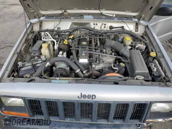 2000 Jeep Cherokee with VIN 1J4FF48S5YL172583, listed as a Copart auction lot 59605745 with 258,409 mi miles and Salvage title. Bid and sale history available at DreamBid. Image 11.