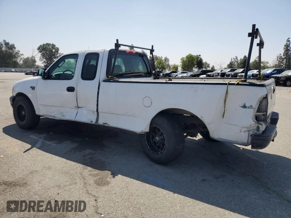 2003 Ford F-150 XL with VIN 1FTRX17W53NA54971, listed as a Copart auction lot 63686385 with 133,800 mi miles and Salvage title. Bid and sale history available at DreamBid. Image 2.