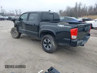 2017 Toyota Tacoma SR5 with VIN 5TFAZ5CN9HX043074, listed as a IAAI auction lot 41813109 with 137,335 mi miles and . Bid and sale history available at carsss.com. Image 3.
