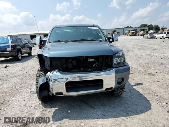 2011 Nissan Titan SL with VIN 1N6AA0EC4BN305296, listed as a Copart auction lot 59001395 with 194,557 mi miles and Salvage title. Bid and sale history available at DreamBid. Image 13.