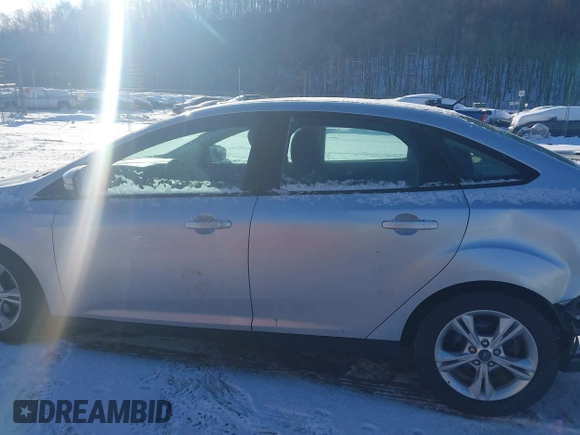 2012 Ford Focus SE with VIN 1FAHP3F27CL457213, listed as a IAAI auction lot 41303904 with 215,044 mi miles and . Bid and sale history available at DreamBid. Image 14.