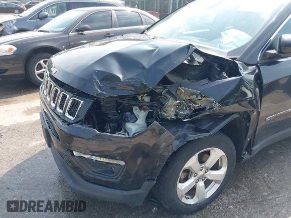 2018 Jeep Compass Latitude with VIN 3C4NJDBB2JT114644, listed as a IAAI auction lot 42499210 with 82,988 mi miles and . Bid and sale history available at DreamBid. Image 6.