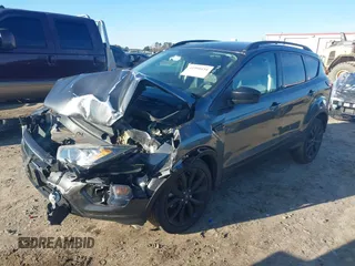 2019 Ford Escape SE z VIN 1FMCU0GD4KUA91551, wystawiony jako IAAI lot #41590151 z przebiegiem Nie podano mil oraz . Historia ofert i sprzedaży dostępna na DreamBid. Obrazek 18.
