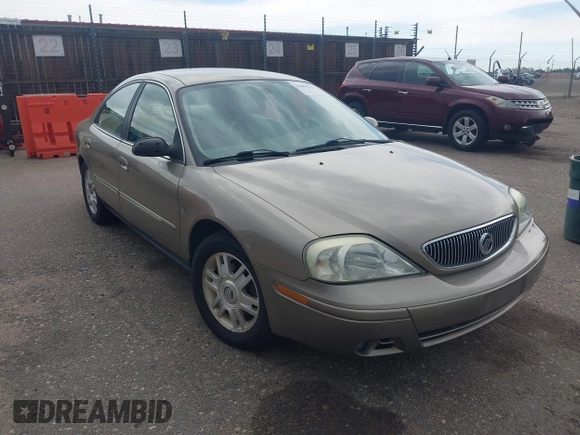 2005 Mercury Sable LS z VIN 1MEFM55S85A605535, wystawiony jako IAAI lot #42490113 z przebiegiem 112 031 mil mil oraz . Historia ofert i sprzedaży dostępna na DreamBid. Obrazek 1.