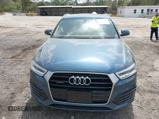 2018 Audi Q3 Premium Plus z VIN WA1JCCFS8JR014631, wystawiony jako IAAI lot #41958696 z przebiegiem 94 063 mil mil oraz . Historia ofert i sprzedaży dostępna na DreamBid. Obrazek 12.