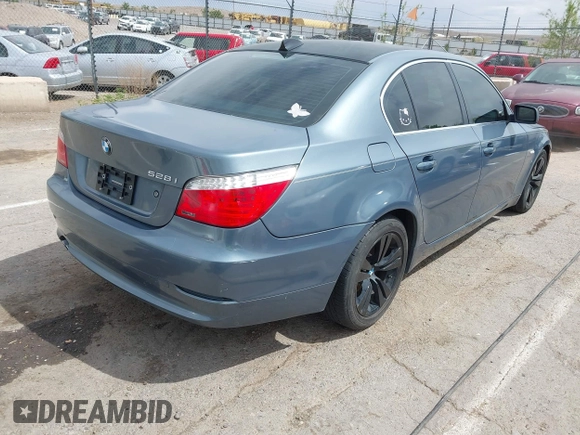 2009 BMW 5 Series 528i with VIN WBANU53539C117465, listed as a IAAI auction lot 42200311 with 158,155 mi miles and . Bid and sale history available at carsss.com. Image 4.