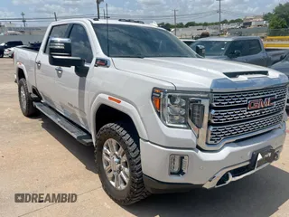 2021 GMC Sierra 2500HD Denali z VIN 1GT49REY4MF318331, wystawiony jako Copart lot #61989355 z przebiegiem 22 590 mil mil oraz Czysty tytuł • Clean title. Historia ofert i sprzedaży dostępna na DreamBid. Obrazek 1.