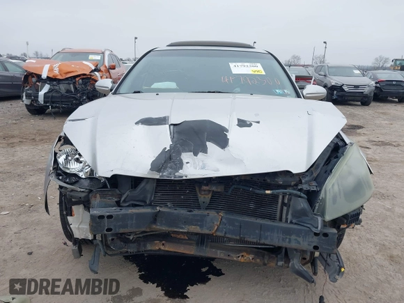 2005 Nissan Altima SE with VIN 1N4BL11E65C133566, listed as a IAAI auction lot 41792300 with 169,733 mi miles. Bid and sale history available at carsss.com. Image 12.