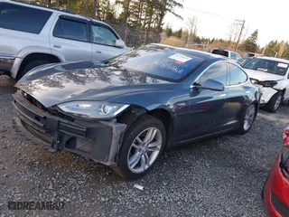2013 Tesla Model S with VIN 5YJSA1AG0DFP09767, listed as a IAAI auction lot 41720419 with 148473 miles. Bid and sale history available at carsss.com. Image 20.