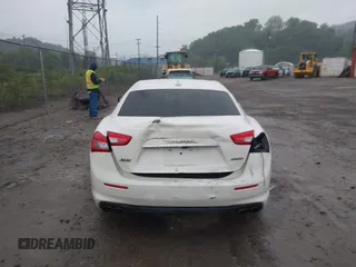 2018 Maserati Ghibli S Q4 z VIN ZAM57YTA5J1268683, wystawiony jako IAAI lot #42359671 z przebiegiem 54 981 mil mil oraz . Historia ofert i sprzedaży dostępna na DreamBid. Obrazek 16.