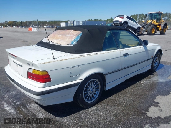 1996 BMW 3-Series 328IC with VIN WBABK8324TET92418, listed as a IAAI auction lot 41815664 with 128,661 mi miles. Bid and sale history available at carsss.com. Image 4.