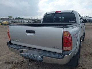 2008 Toyota Tacoma PreRunner with VIN 3TMJU62N48M063986, listed as a IAAI auction lot 41551637 with 235,885 mi miles and . Bid and sale history available at DreamBid. Image 4.