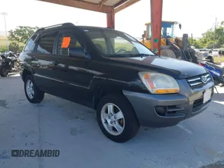 2007 Kia Sportage LX with VIN KNDJF724877450962, listed as a IAAI auction lot 41918290 with 216,476 mi miles. Bid and sale history available at carsss.com. Image 1.
