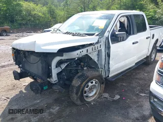 2021 Ford F-150 XL with VIN 1FTFW1E5XMFA29043, listed as a IAAI auction lot 42276606 with Not provided miles and . Bid and sale history available at DreamBid. Image 2.