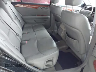2007 Toyota Avalon XL with VIN 4T1BK36B17U233817, listed as a IAAI auction lot 41916994 with 168,923 mi miles and . Bid and sale history available at DreamBid. Image 8.